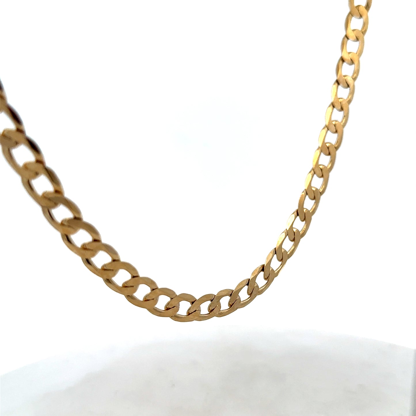 9ct yellow gold curb chain weighing 27.7g, classic jewelry chain with polished links, by Reeves and Sons.