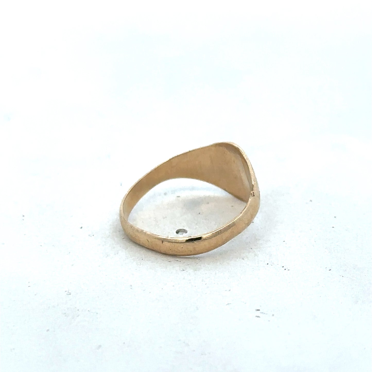 9ct yellow gold signet ring in size M with a smooth polished surface, crafted by Reeves and Sons.