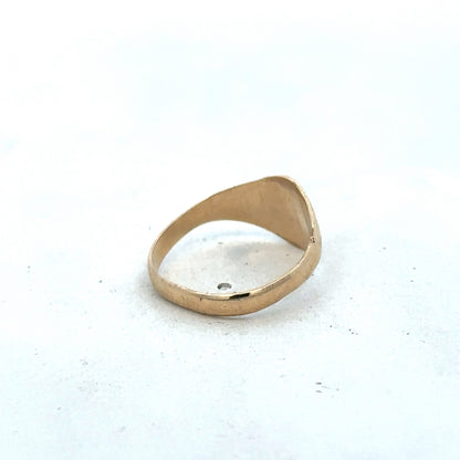 9ct yellow gold signet ring in size M with a smooth polished surface, crafted by Reeves and Sons.