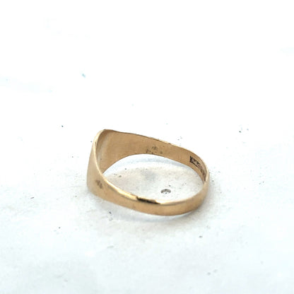 9ct yellow gold signet ring in size M by Reeves and Sons, featuring a polished smooth surface and classic design.