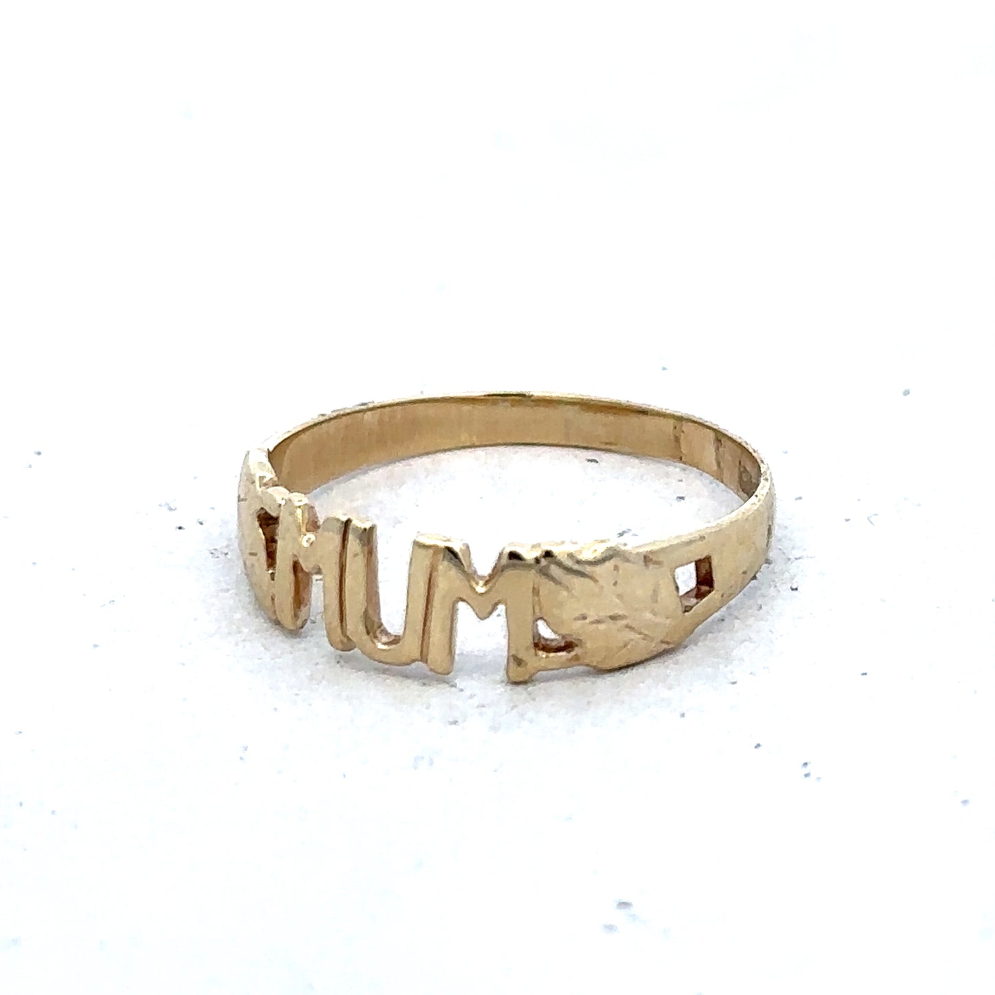 9ct yellow gold MUM ring in size O by Reeves and Sons, featuring a polished band with engraved details visible in the image.