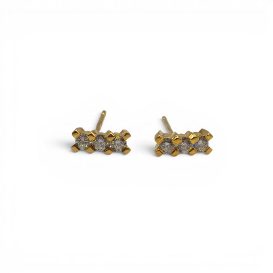 18ct yellow gold diamond stud earrings by Reeves and Sons, featuring sparkling diamonds set in a classic earring design.