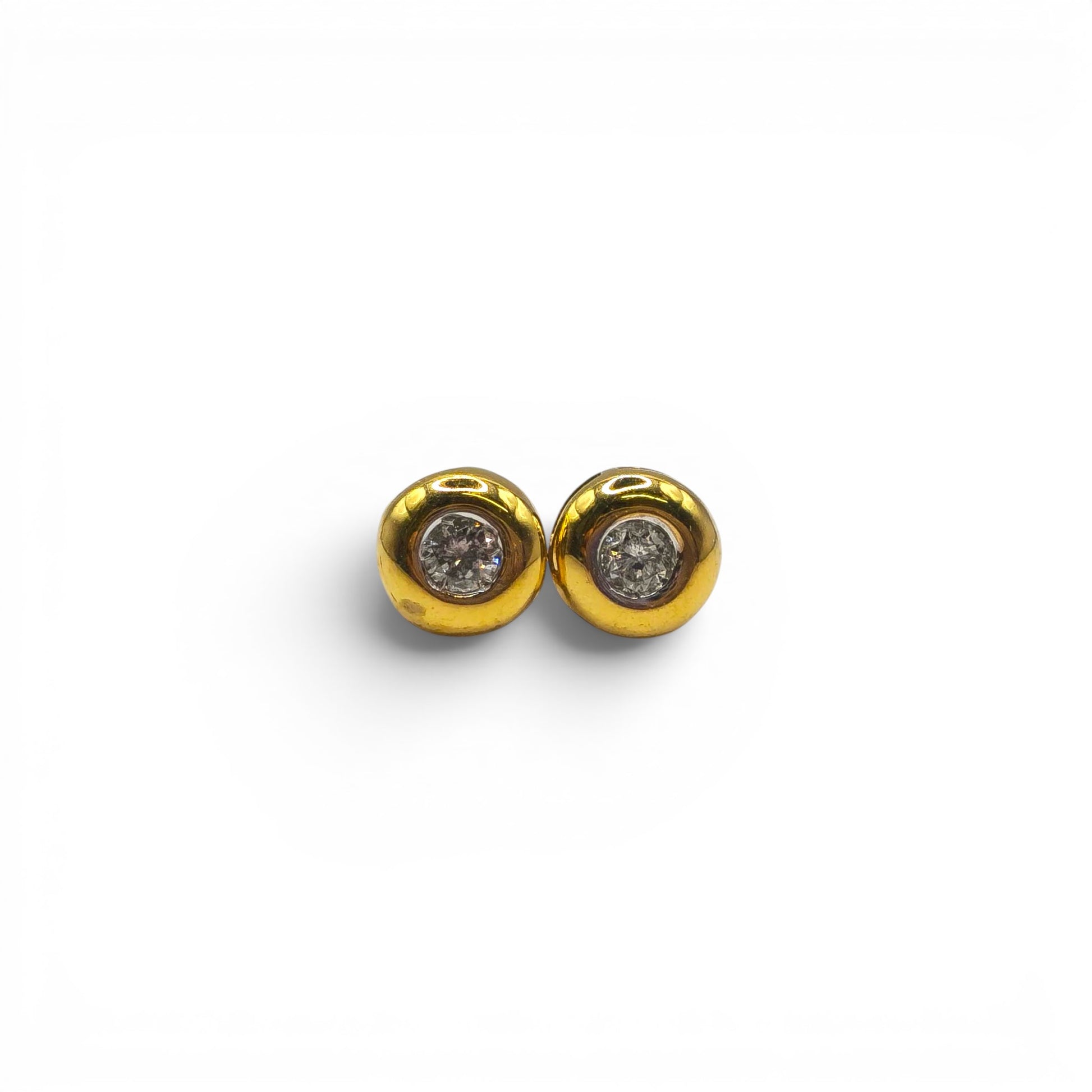 18ct yellow gold diamond stud earrings by Reeves and Sons, showcasing sparkling diamonds set in classic gold studs.
