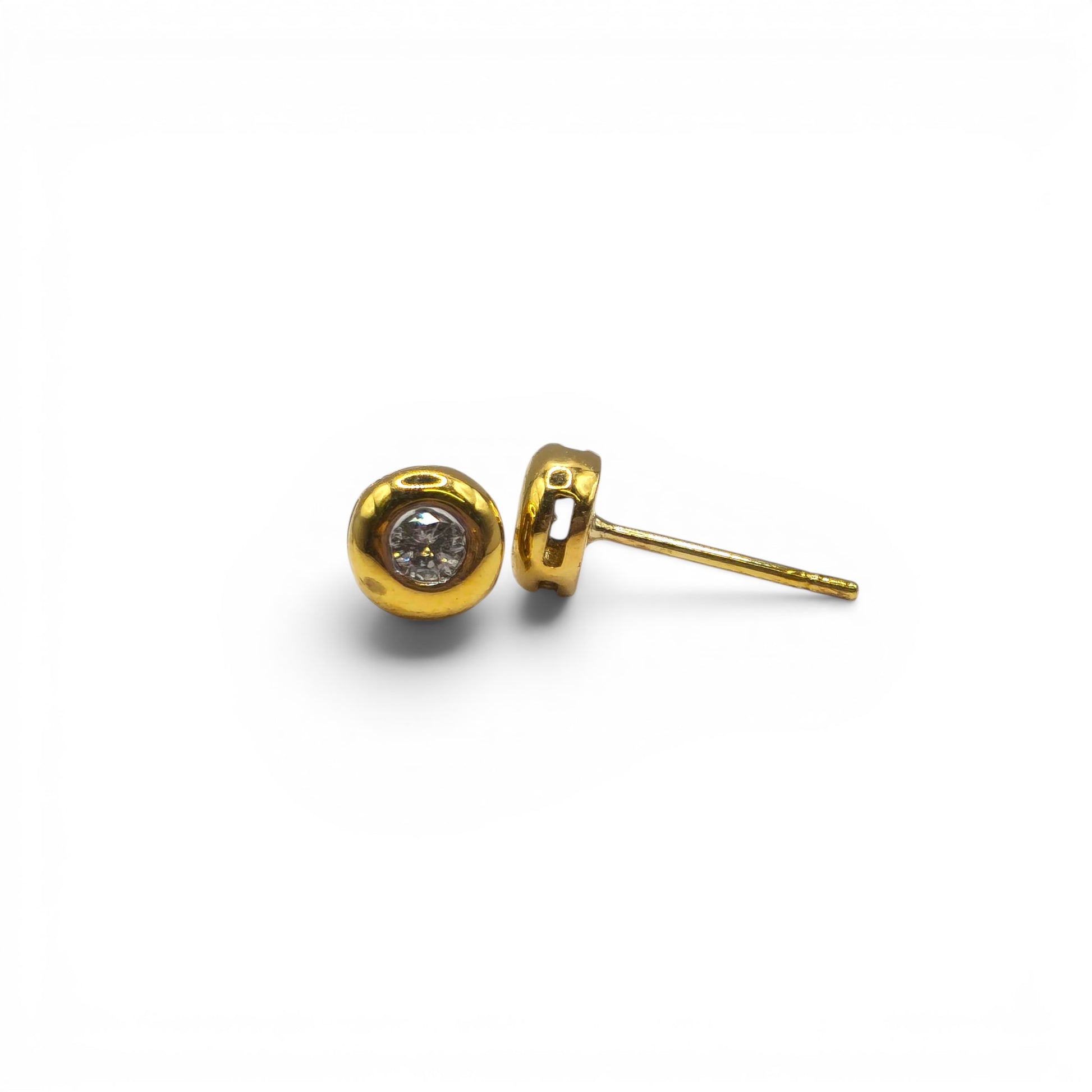 18ct yellow gold diamond stud earrings by Reeves and Sons, featuring sparkling diamonds and classic ear jewelry design.