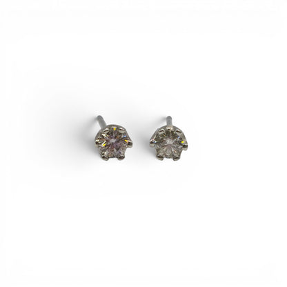9ct white gold diamond stud earrings with sparkling diamonds, featuring a classic and elegant design by Reeves and Sons.