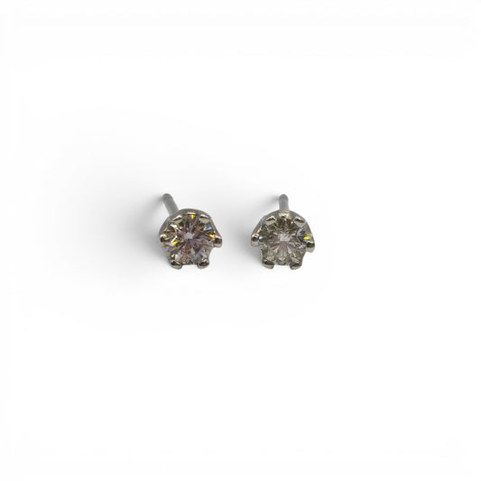 9ct white gold diamond stud earrings with sparkling diamonds, featuring a classic and elegant design by Reeves and Sons.