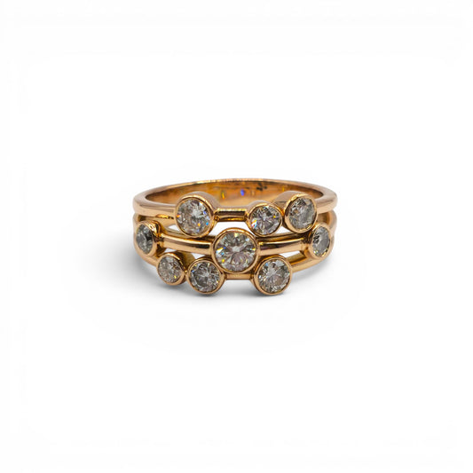 18ct rose gold diamond bubble ring by Reeves and Sons, featuring a delicate design with sparkling diamonds and smooth gold finish.