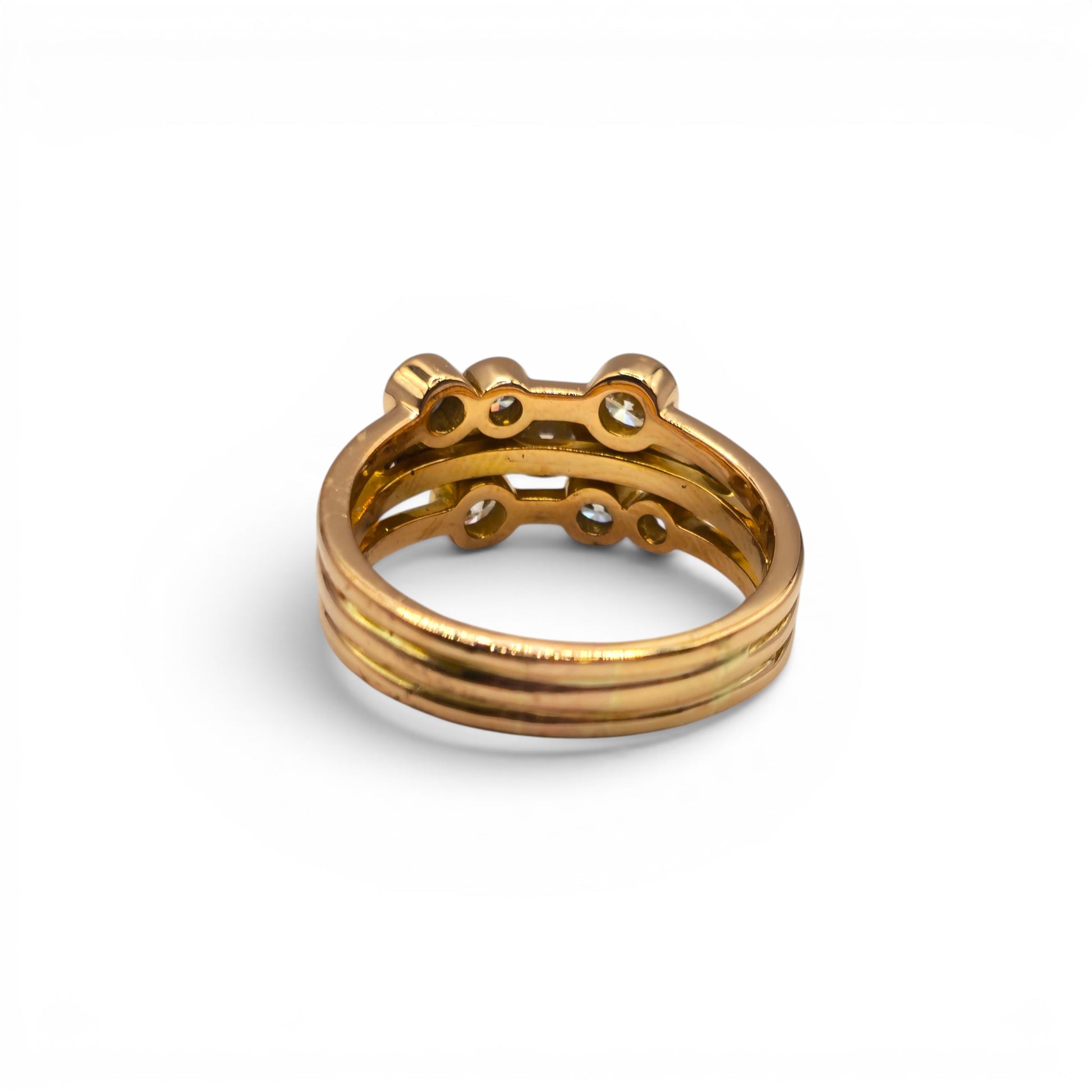 18ct rose gold diamond bubble ring by Reeves and Sons, showcasing a delicate band with sparkling diamonds and a unique bubble design.
