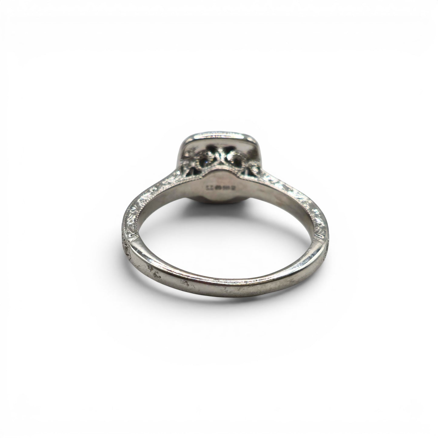 14ct white gold diamond cluster ring with sparkling diamonds, showcasing elegant jewelry design by Reeves and Sons.