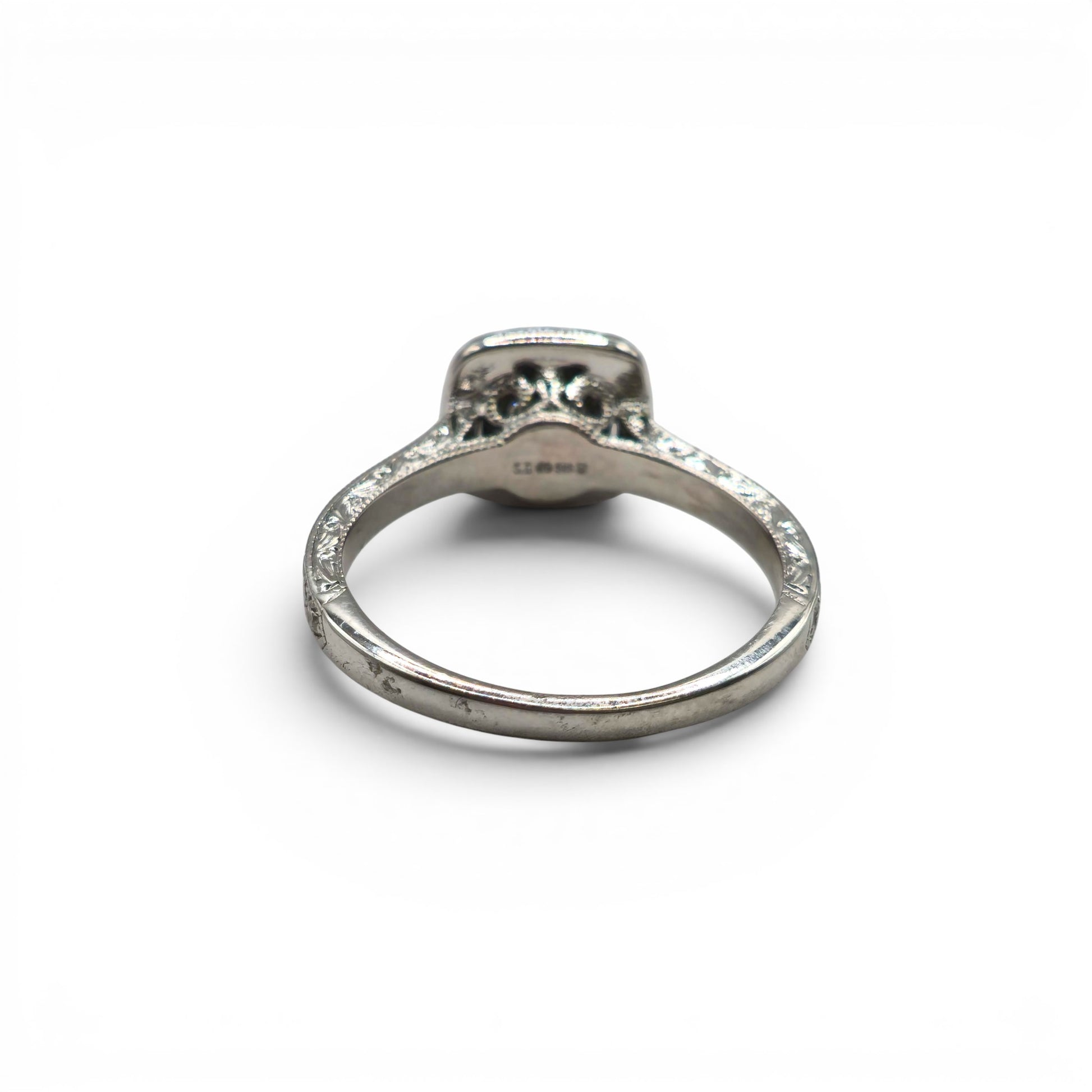 14ct white gold diamond cluster ring with sparkling diamonds, showcasing elegant jewelry design by Reeves and Sons.