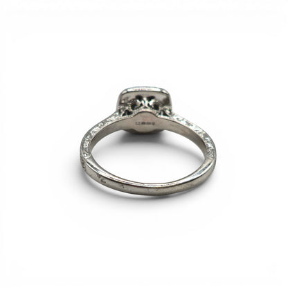 14ct white gold diamond cluster ring with sparkling diamonds, showcasing elegant jewelry design by Reeves and Sons.