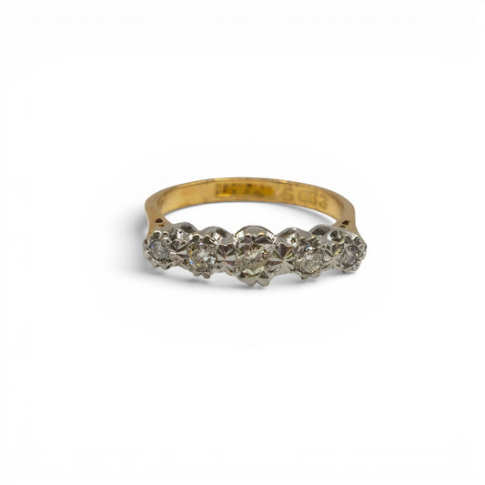 18ct yellow gold diamond ring by Reeves and Sons featuring a sparkling diamond set in an elegant band.