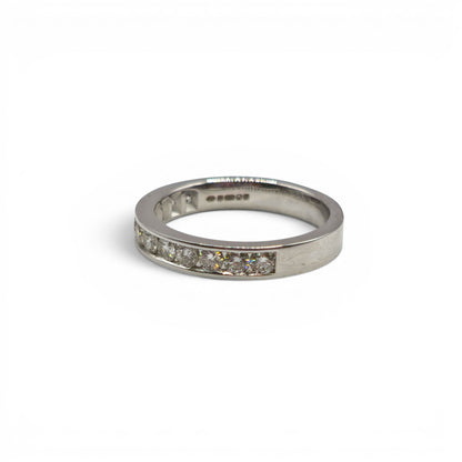 18ct white gold diamond half eternity ring with sparkling diamonds, crafted by Reeves and Sons.