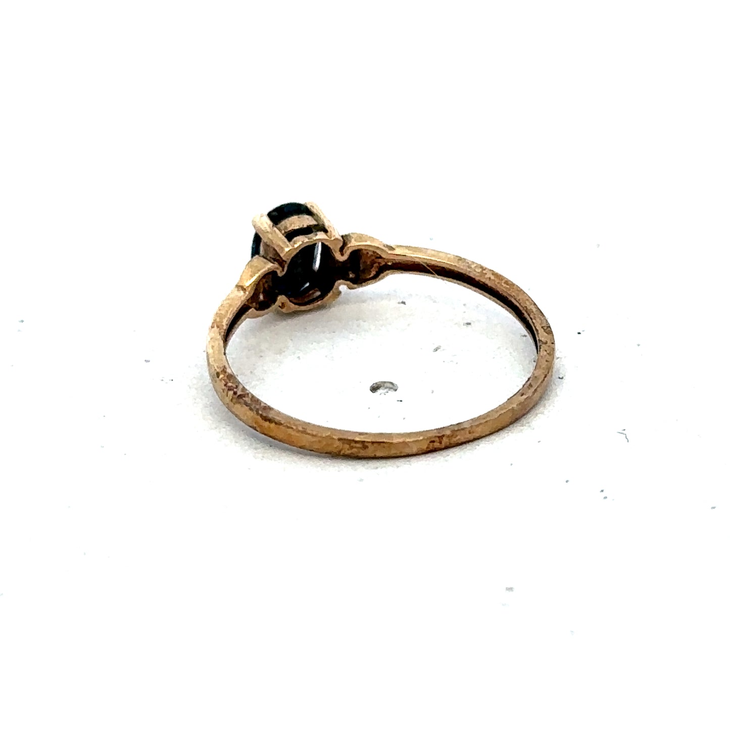 9ct yellow gold ring in size M with a smooth band, crafted by Reeves and Sons, shown on a neutral background.