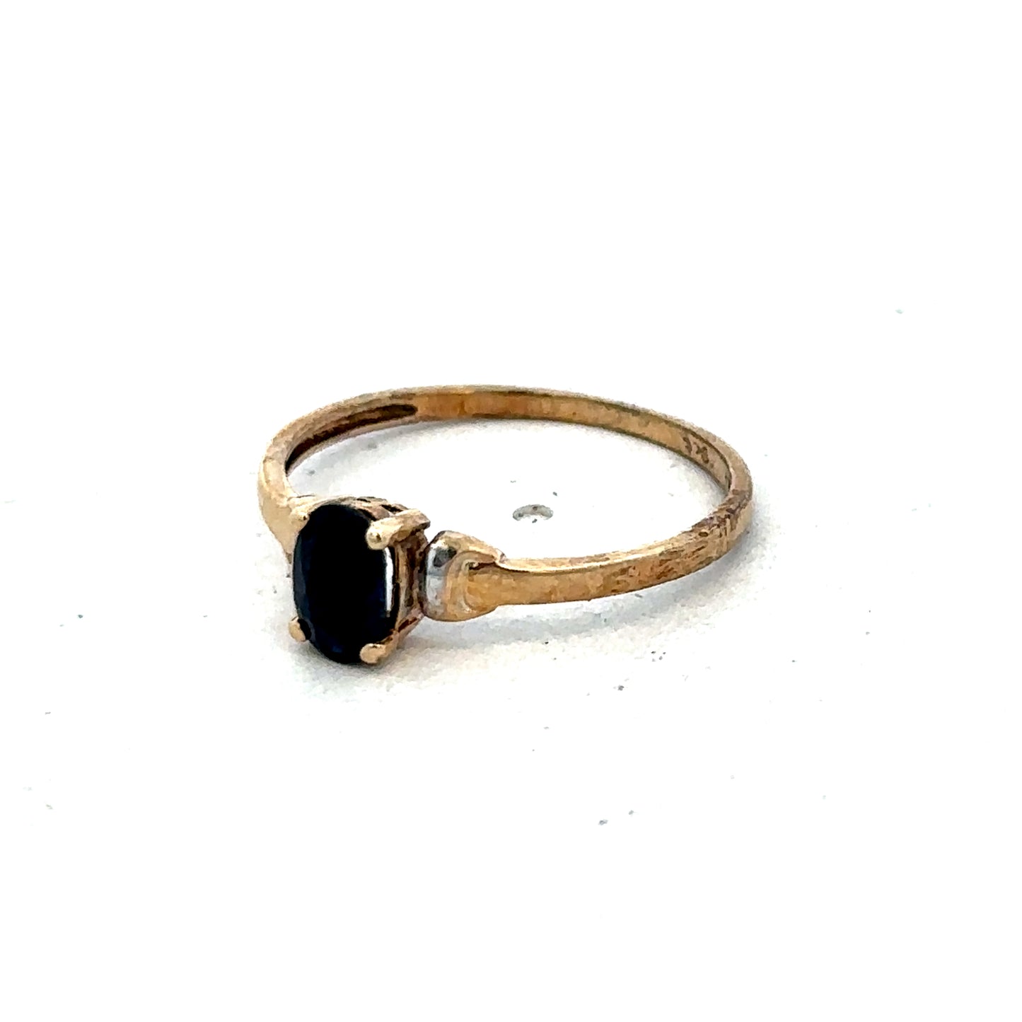 9ct yellow gold ring in size M by Reeves and Sons, featuring a smooth polished band on a white background.