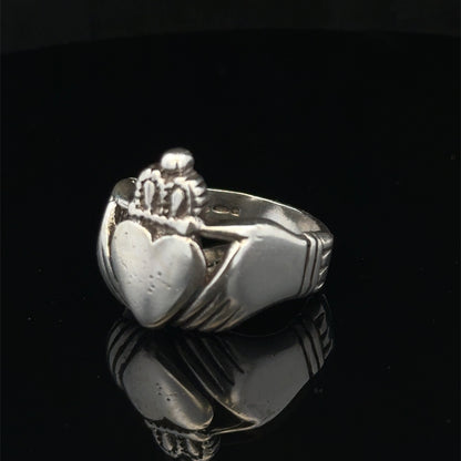 Silver Claddagh ring in size Z1 by Reeves and Sons, featuring traditional Irish design with detailed craftsmanship.