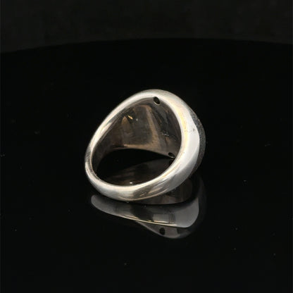 Silver ring size P by Reeves and Sons, featuring a polished band with a sleek, classic design.