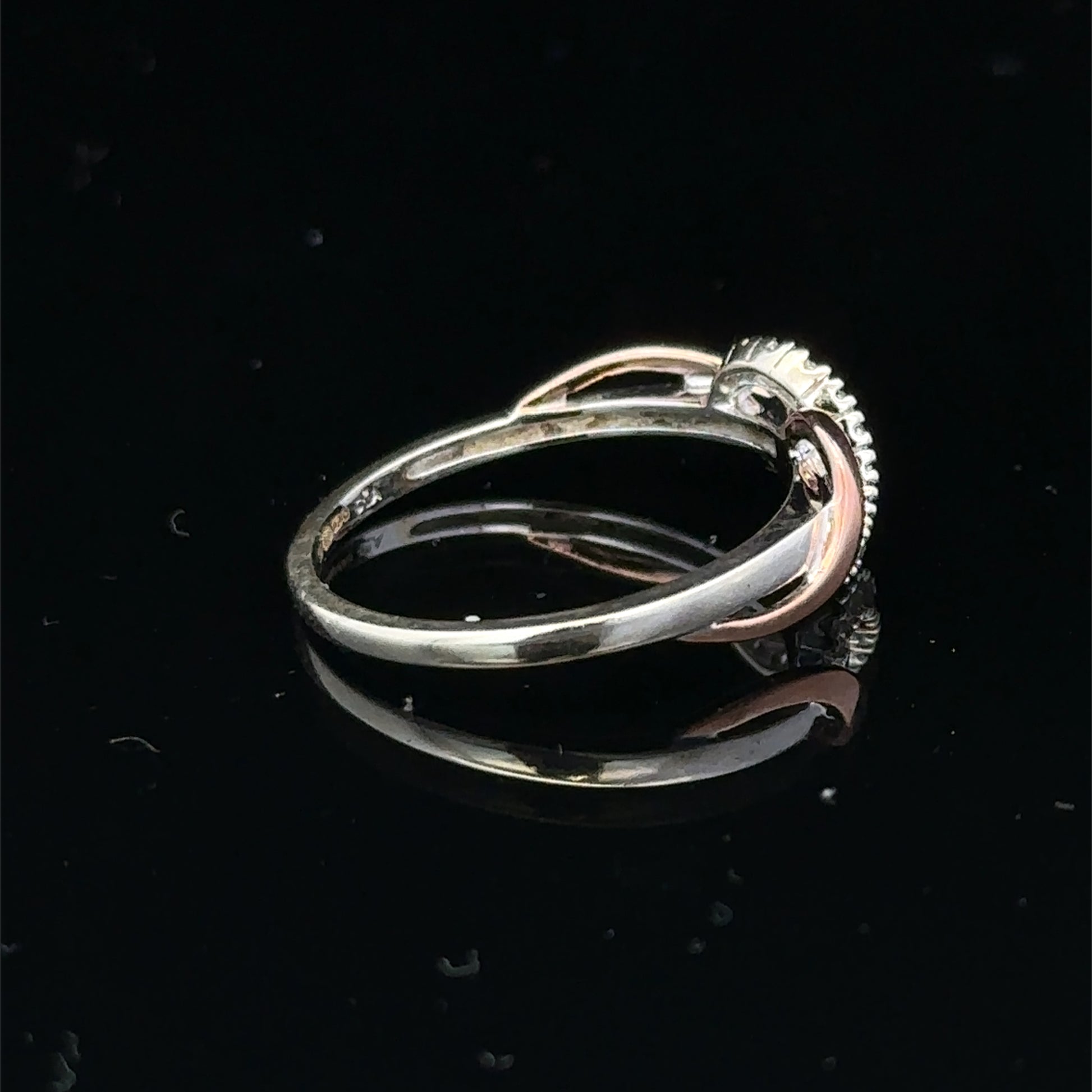 9ct white gold diamond ring in size M with sparkling diamonds, featuring a sleek design by Reeves and Sons.