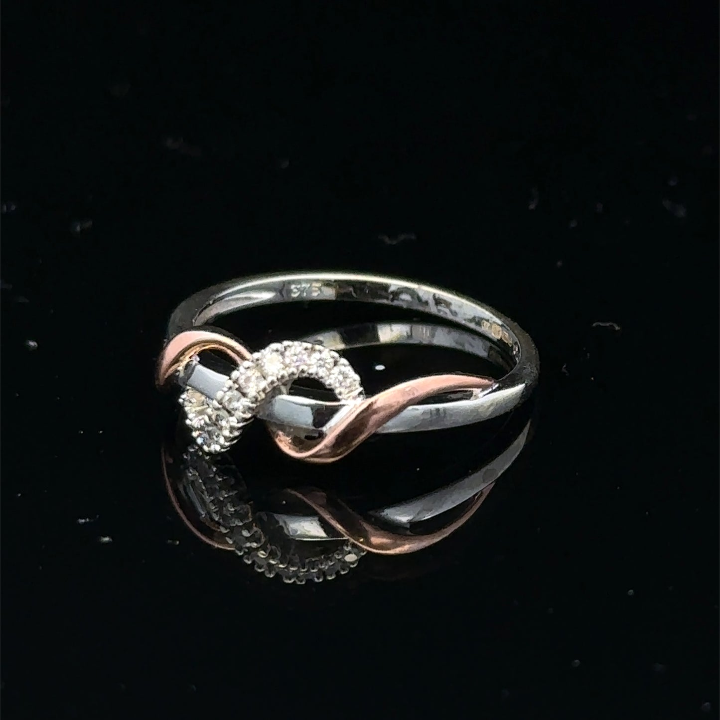 9ct white gold diamond ring in size M with sparkling diamonds, crafted by Reeves and Sons.