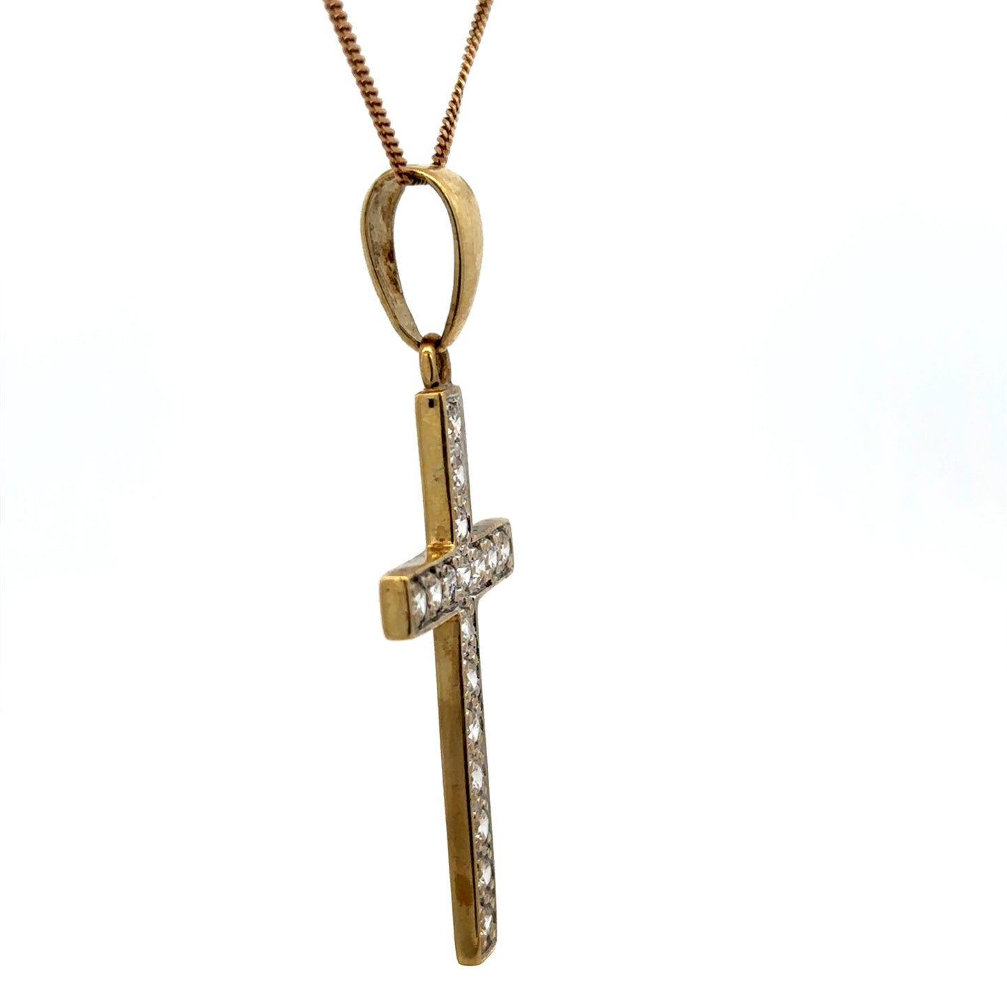 9ct yellow gold cross pendant weighing 4.6g, featuring a detailed design, from Reeves and Sons.