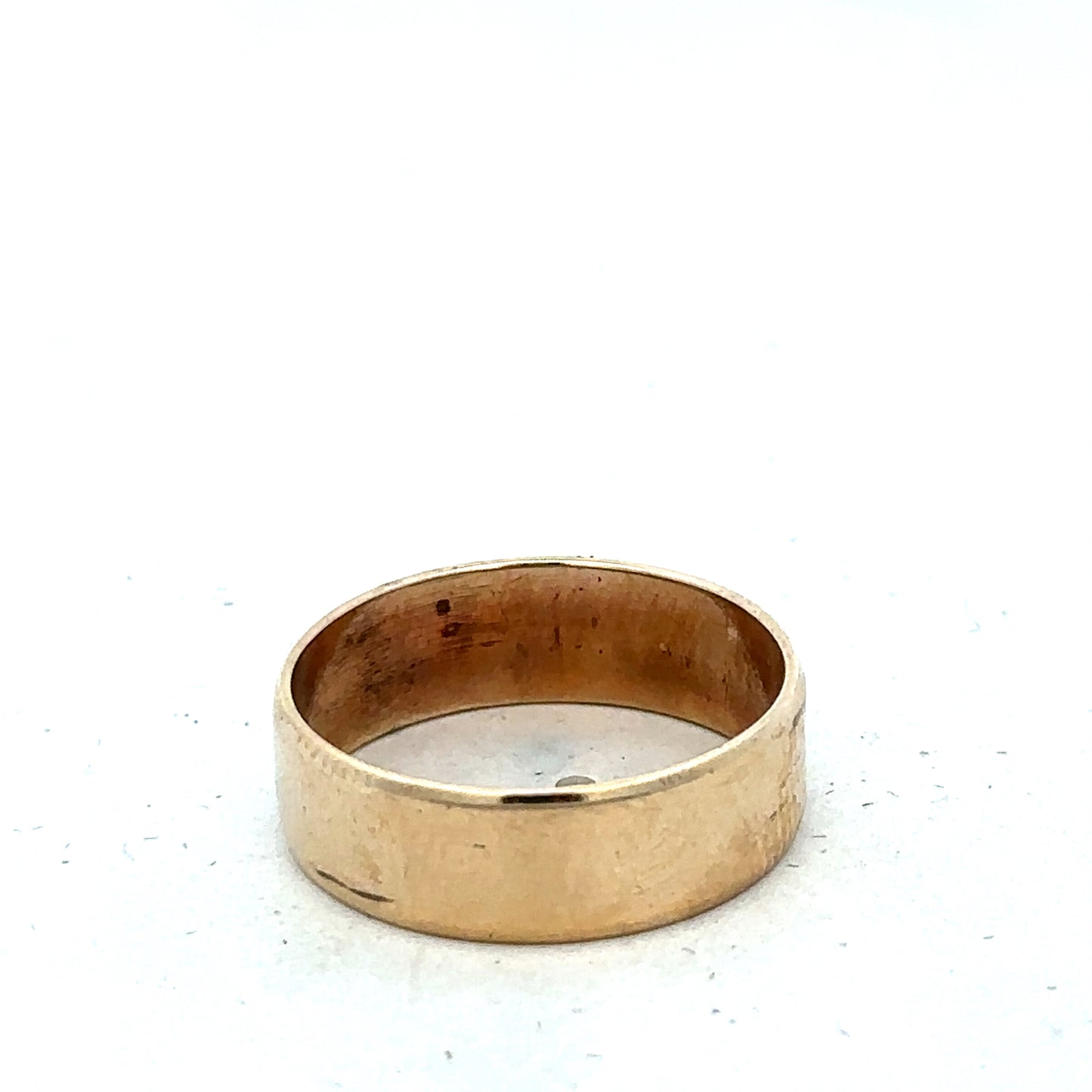 9ct yellow gold band ring in size P1/2, smooth polished finish, crafted by Reeves and Sons, shown on a neutral background.