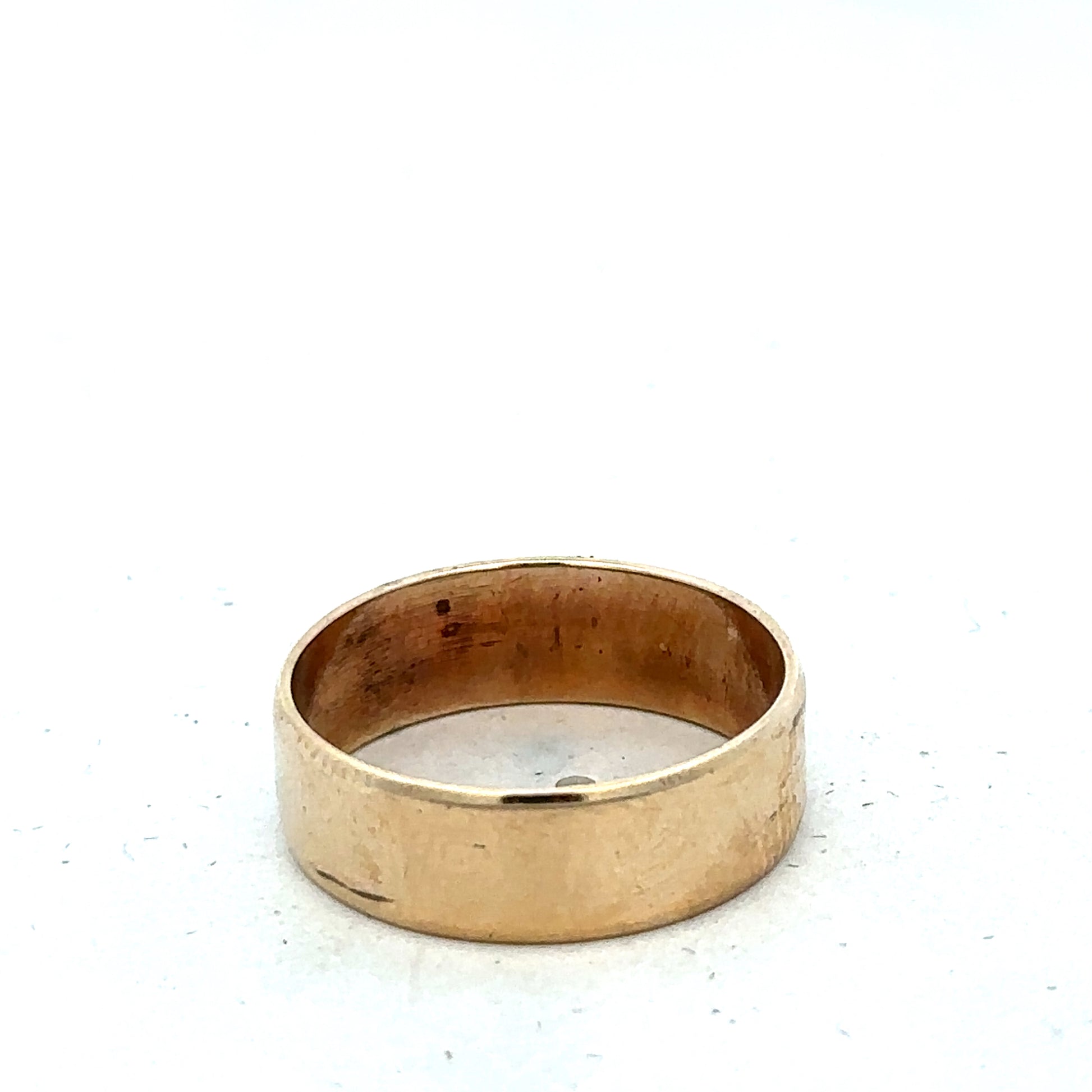 9ct yellow gold band ring in size P1/2, smooth polished finish, crafted by Reeves and Sons, shown on a neutral background.