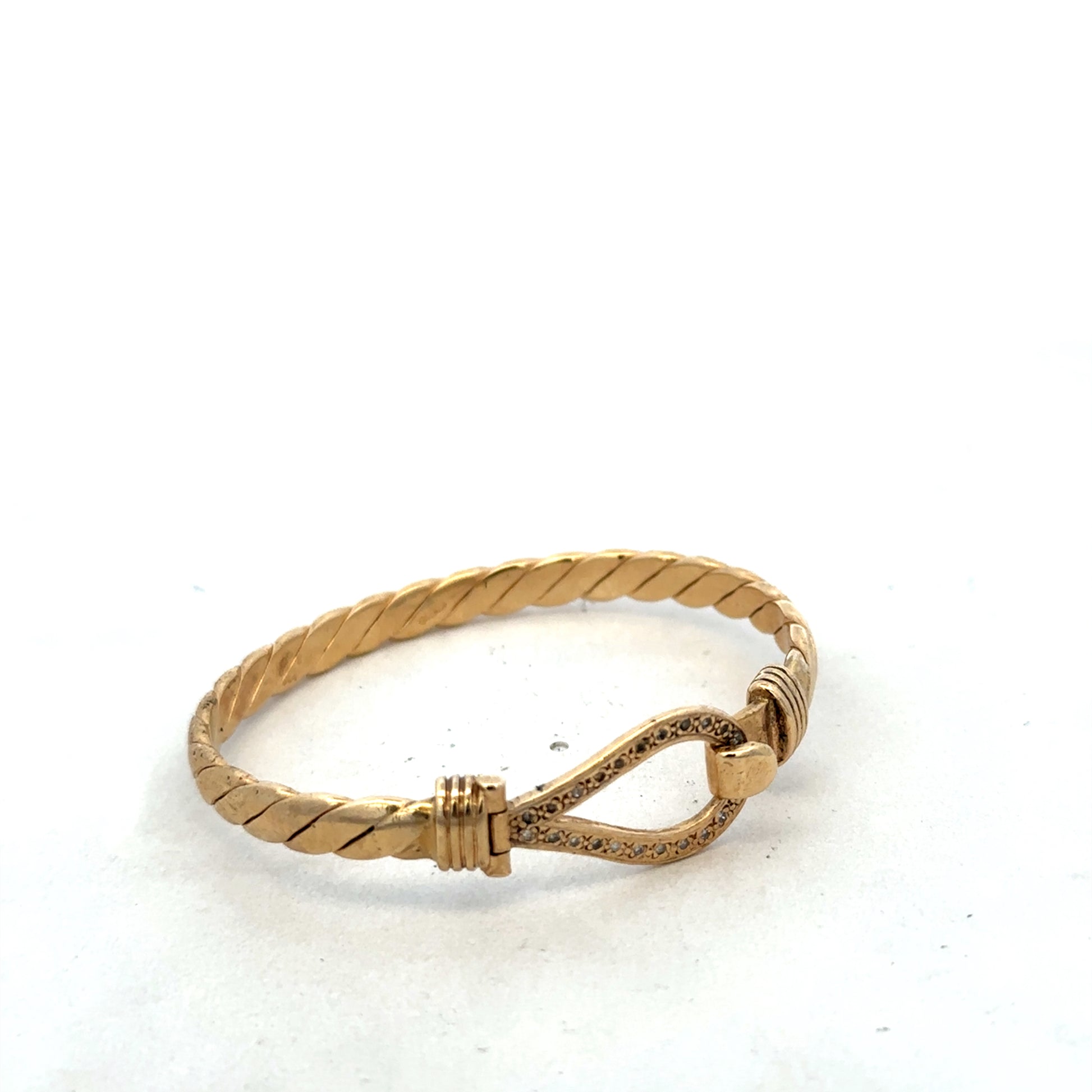 9ct yellow gold bracelet bangle weighing 12.7g, shiny, smooth surface, classic design, by Reeves and Sons.