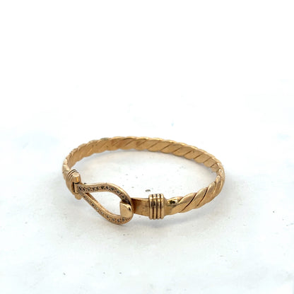 9ct yellow gold bracelet bangle by Reeves and Sons, featuring a smooth, polished finish and a lightweight design.