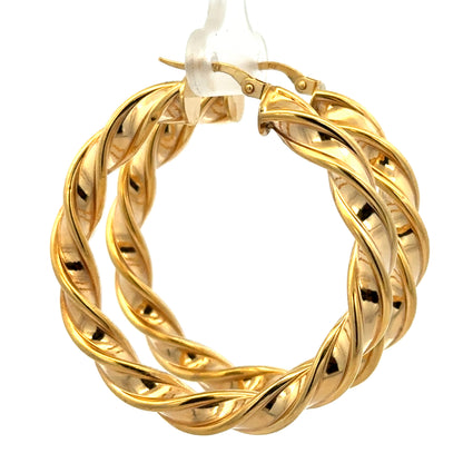 9ct yellow gold hoop earrings weighing 4.6g from Reeves and Sons, close-up of classic round hoop style.