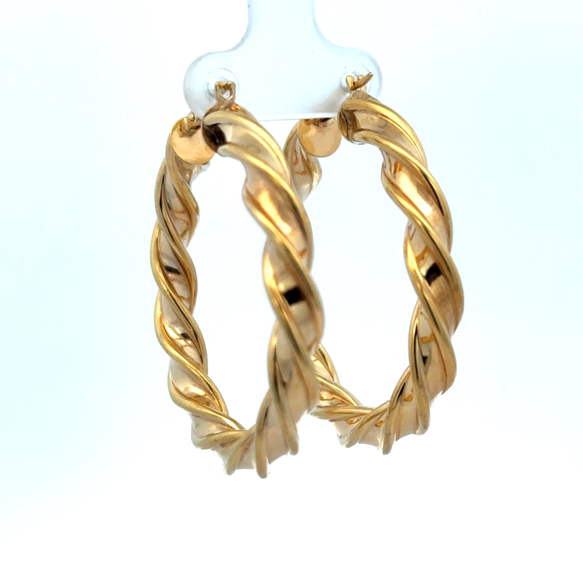 9ct yellow gold hoop earrings weighing 4.6g with a smooth finish, designed by Reeves and Sons, shown from a front view.