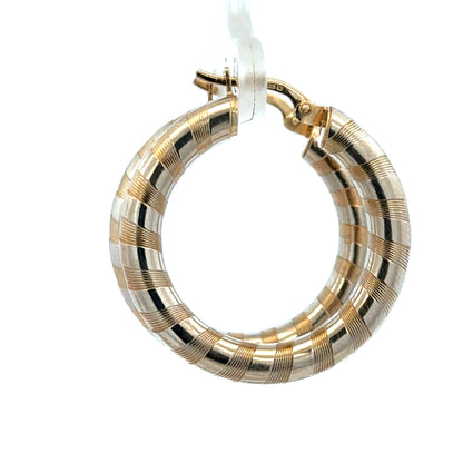9ct yellow gold hoop earrings weighing 3.6g, stylish and classic jewelry by Reeves and Sons, showing the hoops on a white background