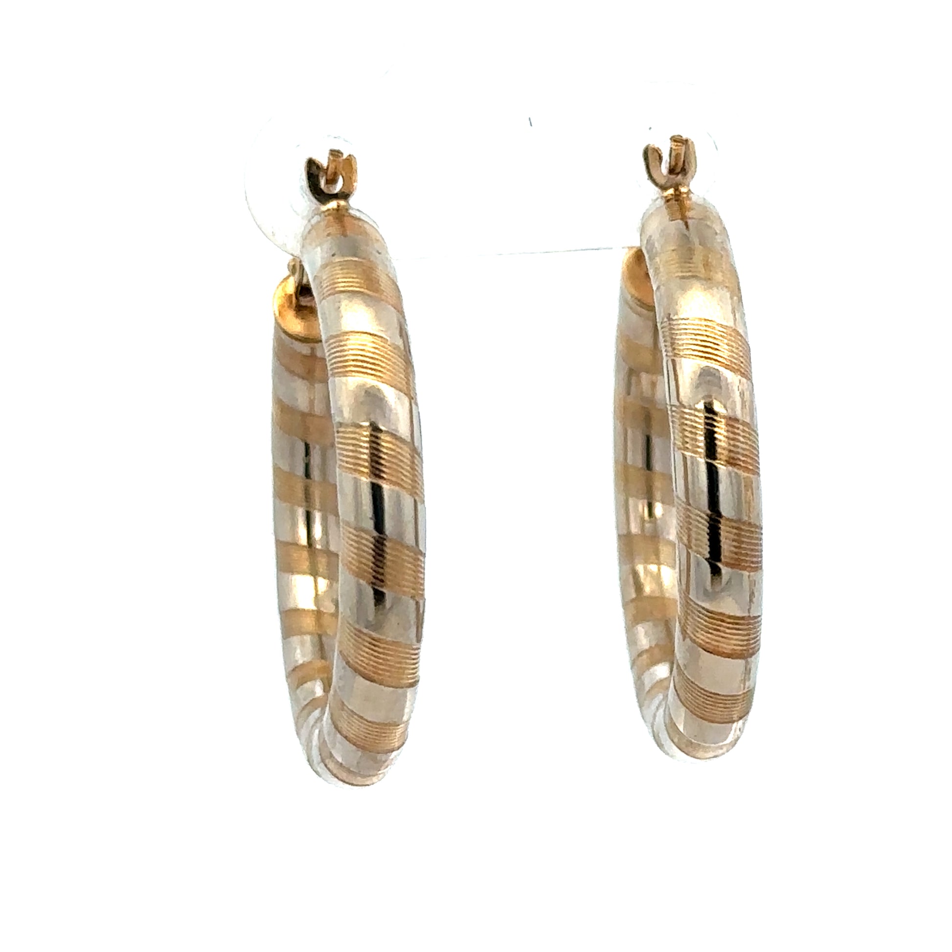 9ct yellow gold hoop earrings weighing 3.6g, stylish and classic jewelry from Reeves and Sons, shown in a close-up image.