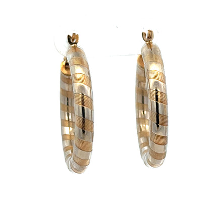 9ct yellow gold hoop earrings weighing 3.6g, stylish and classic jewelry from Reeves and Sons, shown in a close-up image.