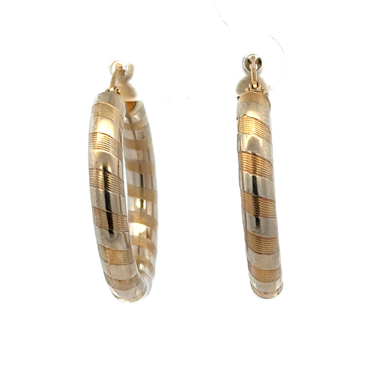 9ct yellow gold hoop earrings by Reeves and Sons, lightweight 3.6g, classic round hoops shown on a plain background