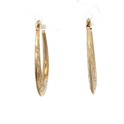 Reeves and Sons 9ct yellow gold hoop earrings, lightweight 0.6g, featuring classic circular design for everyday wear.