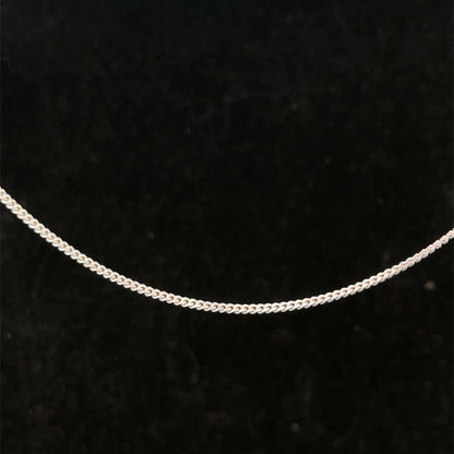 9ct white gold chain weighing 2.9g with a delicate link design, by Reeves and Sons, shown in the image.