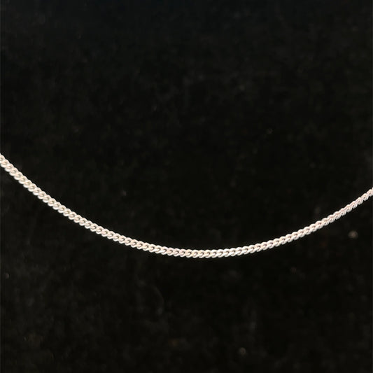 9ct white gold chain weighing 2.9g with a delicate link design, by Reeves and Sons, shown in the image.