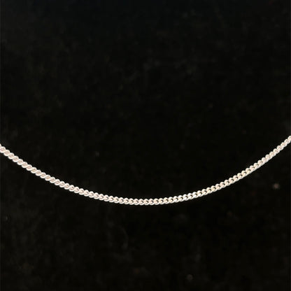 9ct white gold chain weighing 2.9g from Reeves and Sons, showcasing a delicate, polished jewelry chain.