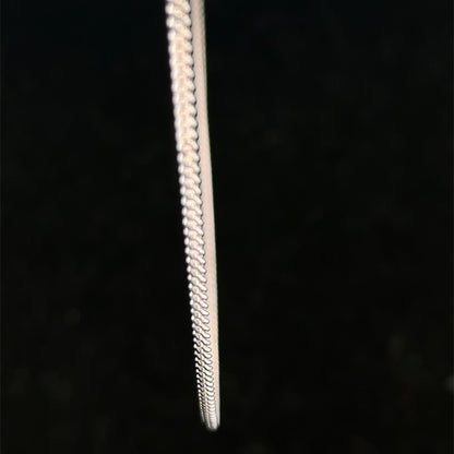 9ct white gold chain weighing 2.9g, featuring a classic link design, from Reeves and Sons.
