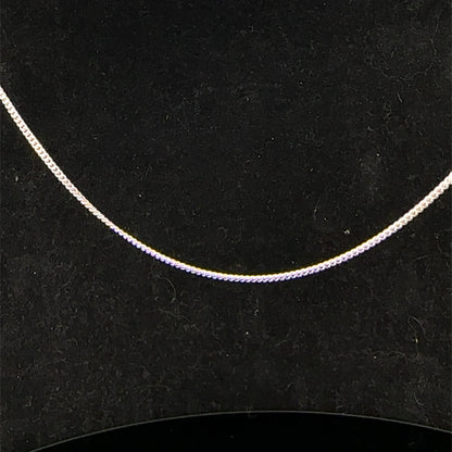 9ct white gold chain weighing 2.9g, showcasing a delicate and polished Reeves and Sons jewelry chain on a neutral background.