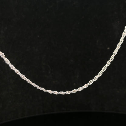 9ct white gold chain weighing 3.2g, featuring a delicate link design, by Reeves and Sons, shown in the product image.