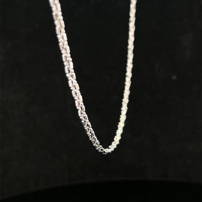 9ct white gold chain weighing 3.2g, featuring a delicate link design, from Reeves and Sons.