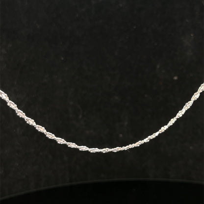 9ct white gold chain weighing 3.2g, featuring a delicate link design from Reeves and Sons.