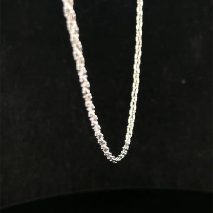 9ct white gold chain weighing 3.2g, featuring a delicate link design from Reeves and Sons.