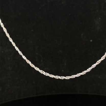 9ct white gold chain weighing 3.2g from Reeves and Sons, showcasing a delicate and polished jewelry chain.