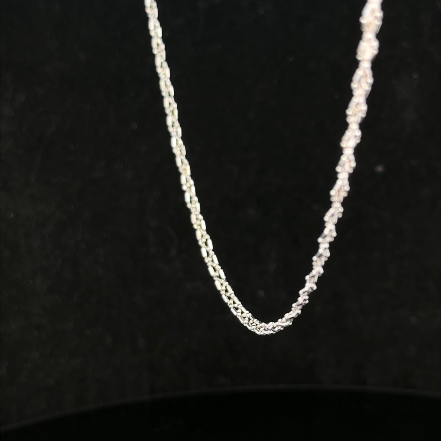 9ct white gold chain weighing 3.2g, Reeves and Sons, displayed on a neutral background showing its fine link design.