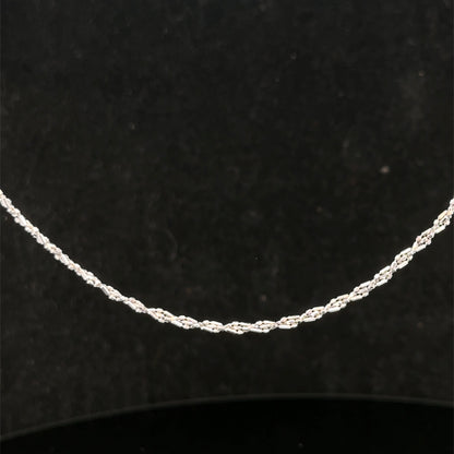 9ct white gold chain weighing 3.2g, featuring a delicate link design from Reeves and Sons, shown in the image.