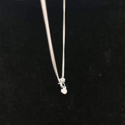 9ct white gold chain weighing 2.7g, from Reeves and Sons, showcasing a delicate, polished chain with detailed links.