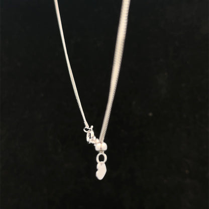 9ct white gold chain weighing 2.7g, featuring a delicate and stylish design from Reeves and Sons.