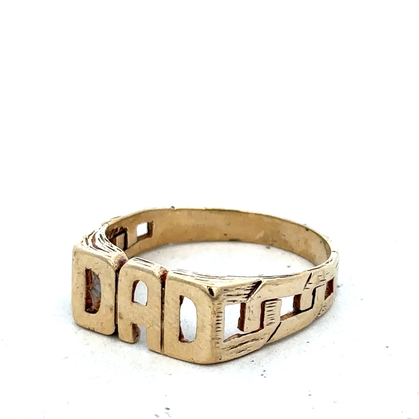 9ct yellow gold DAD ring in size X1/2 with engraved lettering, crafted by Reeves and Sons, displayed on a plain background.